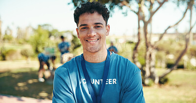 Buy stock photo Man, happy and portrait of volunteer outdoor with community service, NGO or donation project. Smile, confident and face of male charity worker with confidence in field in nature for social activism.