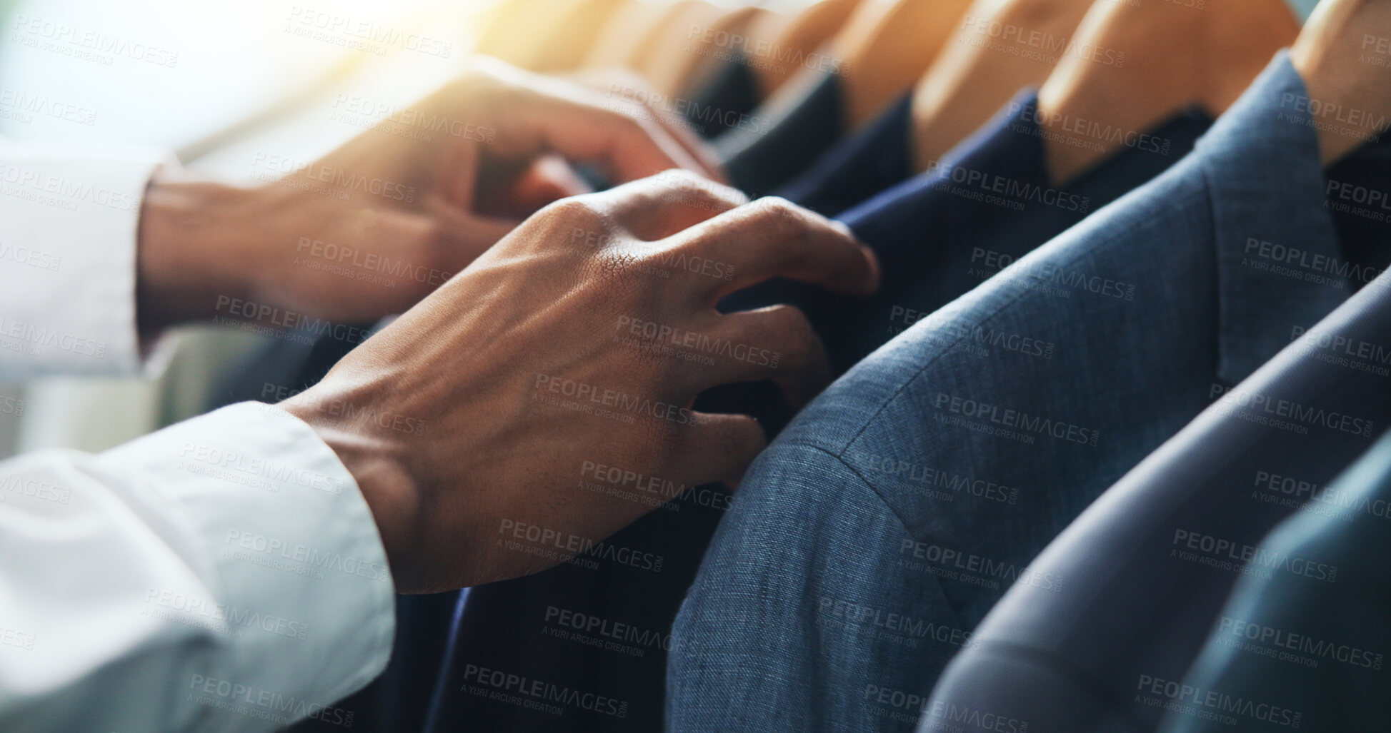 Buy stock photo Shopping, retail and hands of man with clothes on rack for sale, discount and store promotion. Fashion, boutique and customer with choice, decision and option for textile, fabric and formal clothing