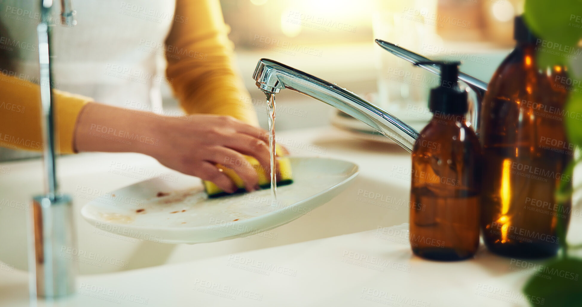 Buy stock photo Woman, hands and washing dishes in kitchen for cleaning, dirt removal and hygiene with foam. Person, plate and water in home for bacteria prevention, responsibility or soap on sponge for disinfection