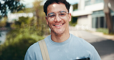 Buy stock photo Portrait, happy student and man at college outdoor for learning, education or scholarship at park. Smile, face or confident person at university campus with glasses for studying or travel to Portugal