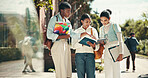People, students and college for textbook research, outdoor and friends talking on education. Women, academy and support with university project or module, conversation and study help with course