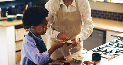 Buy stock photo Baking, learning and kid with mother in kitchen for skill development with ingredients for cupcakes. Teaching, bonding and boy child cooking cookies, muffins or dessert with chef mom together in home