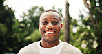 Portrait, black man and college student in park on campus for university, opportunity and studying. Happy, smile and male person in nature with pride for school, education and ecology scholarship