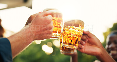 Buy stock photo Hands, friends and cheers with glass of beer with event outdoor for celebration, reunion and gathering. People, closeup and together with alcohol or liquor beverage for toast and special occasion