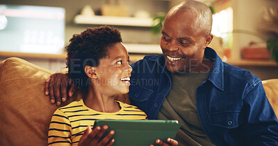 Buy stock photo Happy, dad and child with tablet, home and elearning with app in living room, bonding and internet. House, man and son with tech for education, growth and development for boy, knowledge and online