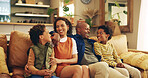 Family, happy and hug on sofa with love, comfort and relax on weekend in home. African parents, children and laugh in living room with bonding, relationship development and trust with care on couch