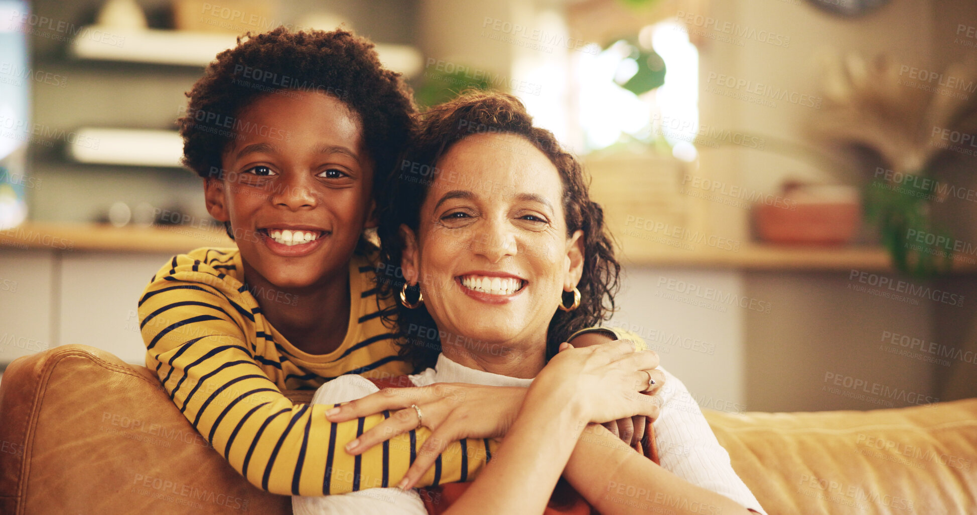 Buy stock photo Hug, portrait and smile of mother with son on sofa in living room of home together for love. Family, safety or security with boy child and single parent woman in apartment for bonding or trust