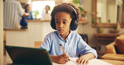 Buy stock photo Tablet, watching and child with headphones, home and kid with information, education and studying for exam. Online, growth and development of boy, African and video for knowledge and scholarship