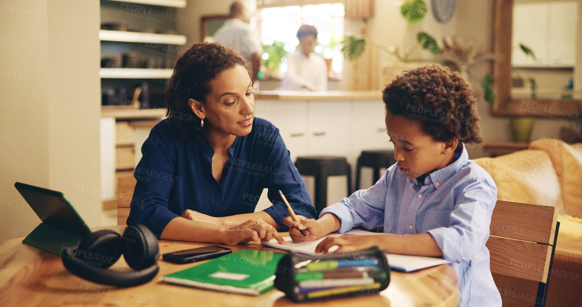 Buy stock photo Education, woman or child writing in home for learning, studying or help for homework at tablet. Mother, son or books in living room for explaining, language development or information on technology