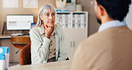 Mature woman, doctor and sore throat in consultation for medical services or professional opinion. People, symptoms and patient in clinic for appointment, checkup and healthcare with illness or virus