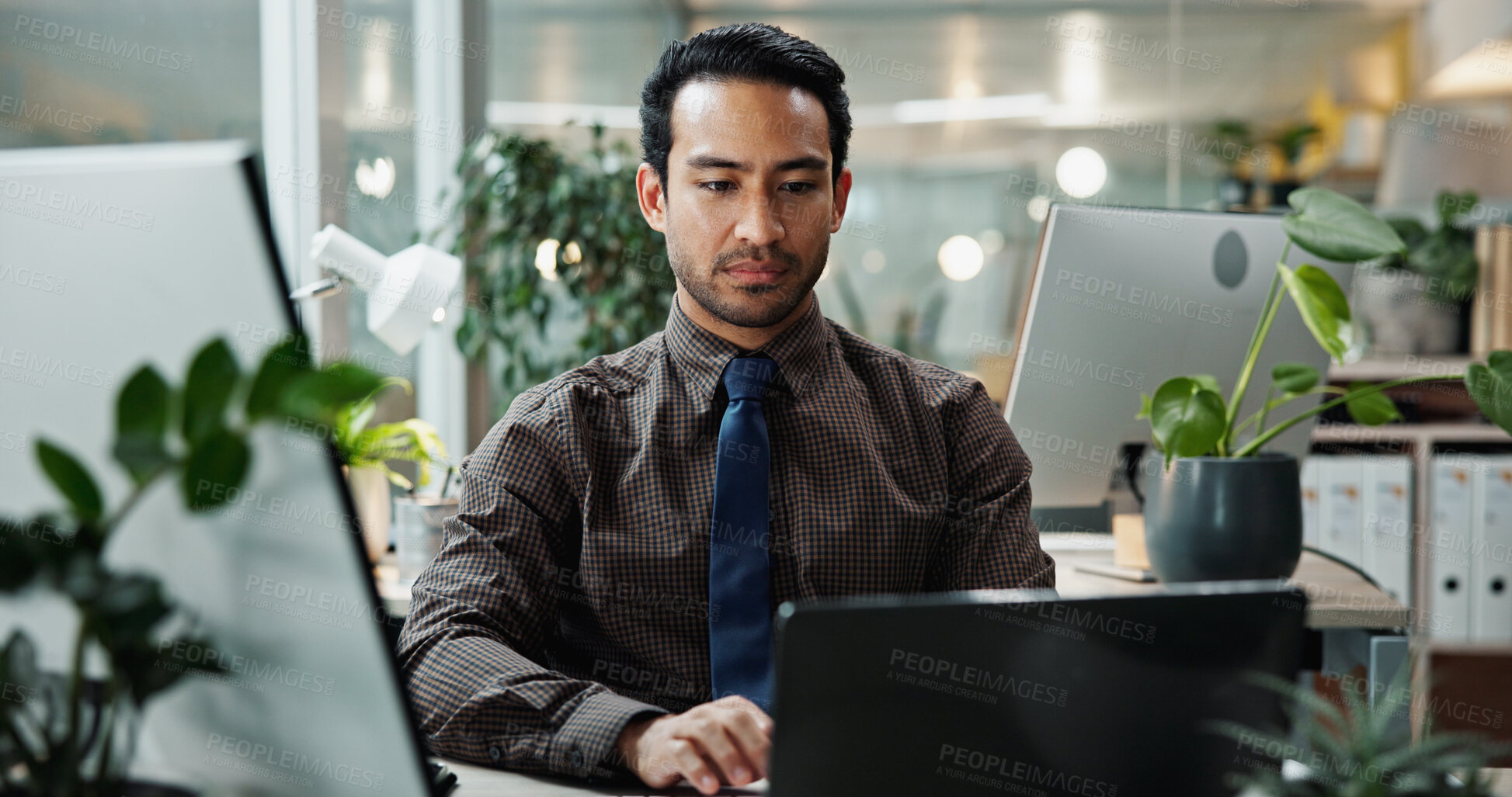 Buy stock photo Asian, research and businessman in office with laptop for typing, creative agency or self publishing. Online, writer or worker with internet, computer or pc for editing of ebook novel with technology