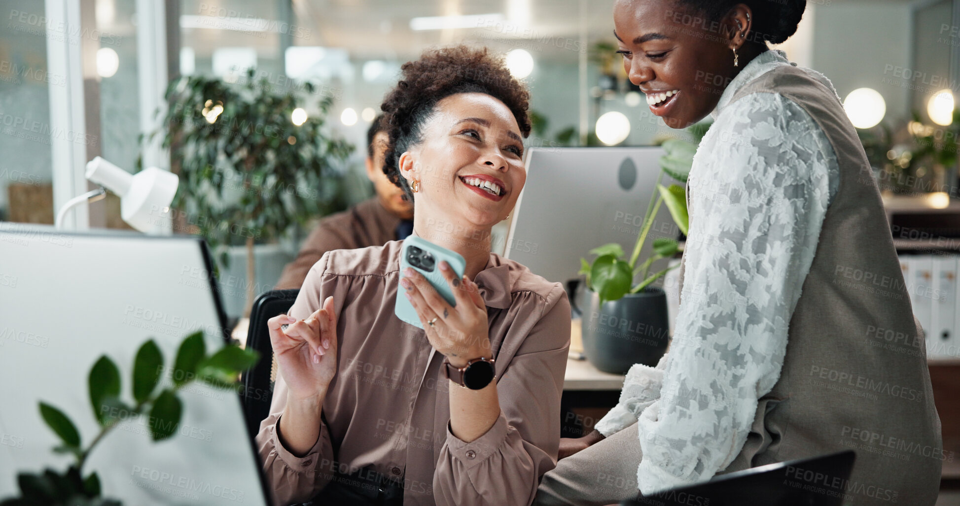 Buy stock photo Business, people and laughing with phone at desk for funny website review, social media post or corporate meme. Designer, employees and show smartphone in office for project research or online news