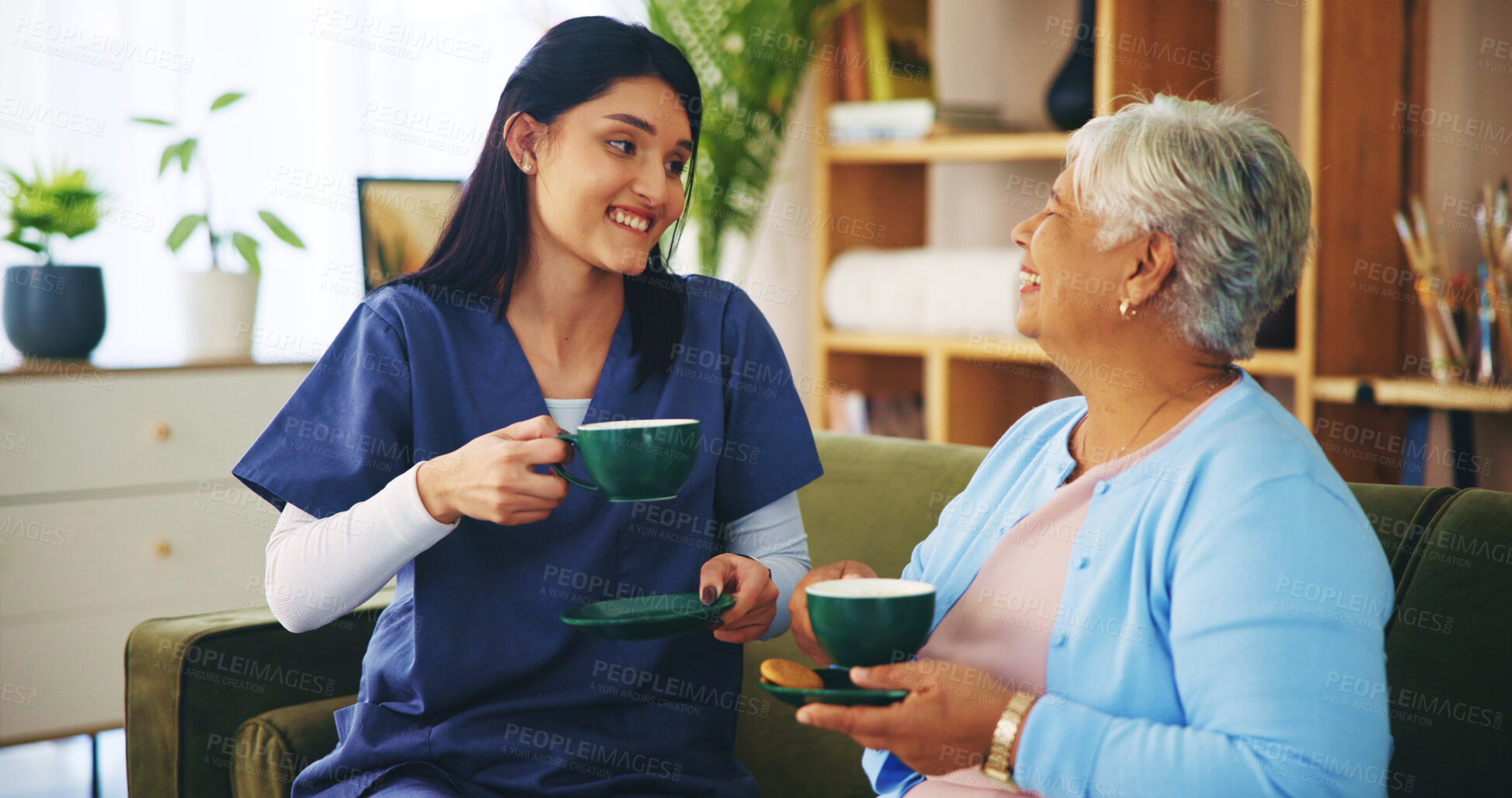 Buy stock photo Senior woman, caregiver and tea in home for retirement support, relax and homecare assistance on sofa. Old person, nurse and happy with drink in morning for conversation, bonding and break in lounge