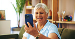 Senior woman, happy and video call on sofa in home for chat, contact or talk with connection on web. Elderly person, smartphone and funny conversation, excited or mobile app for social media in house