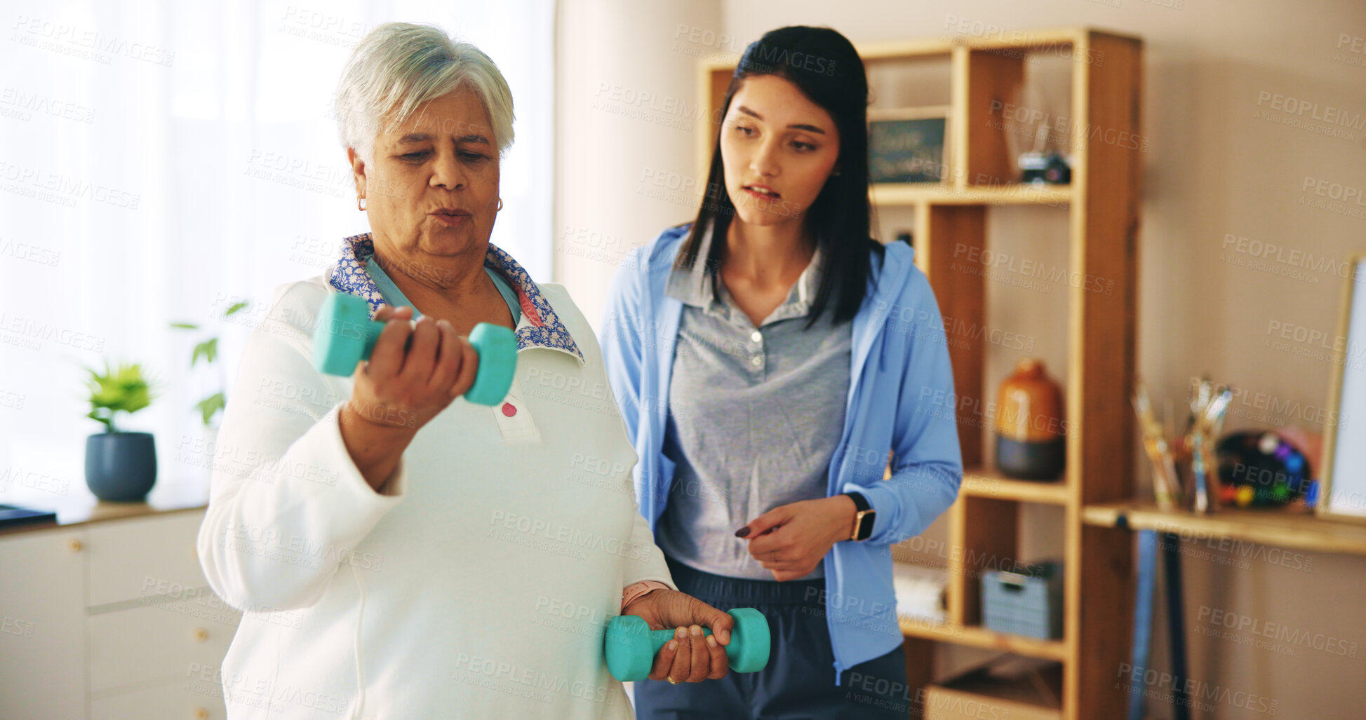 Buy stock photo Senior woman, weight lifting and physiotherapist with dumbbells for fitness, wellness and muscle. People, pensioner and support in rehabilitation or recovery as physiotherapy, arthritis or healthcare