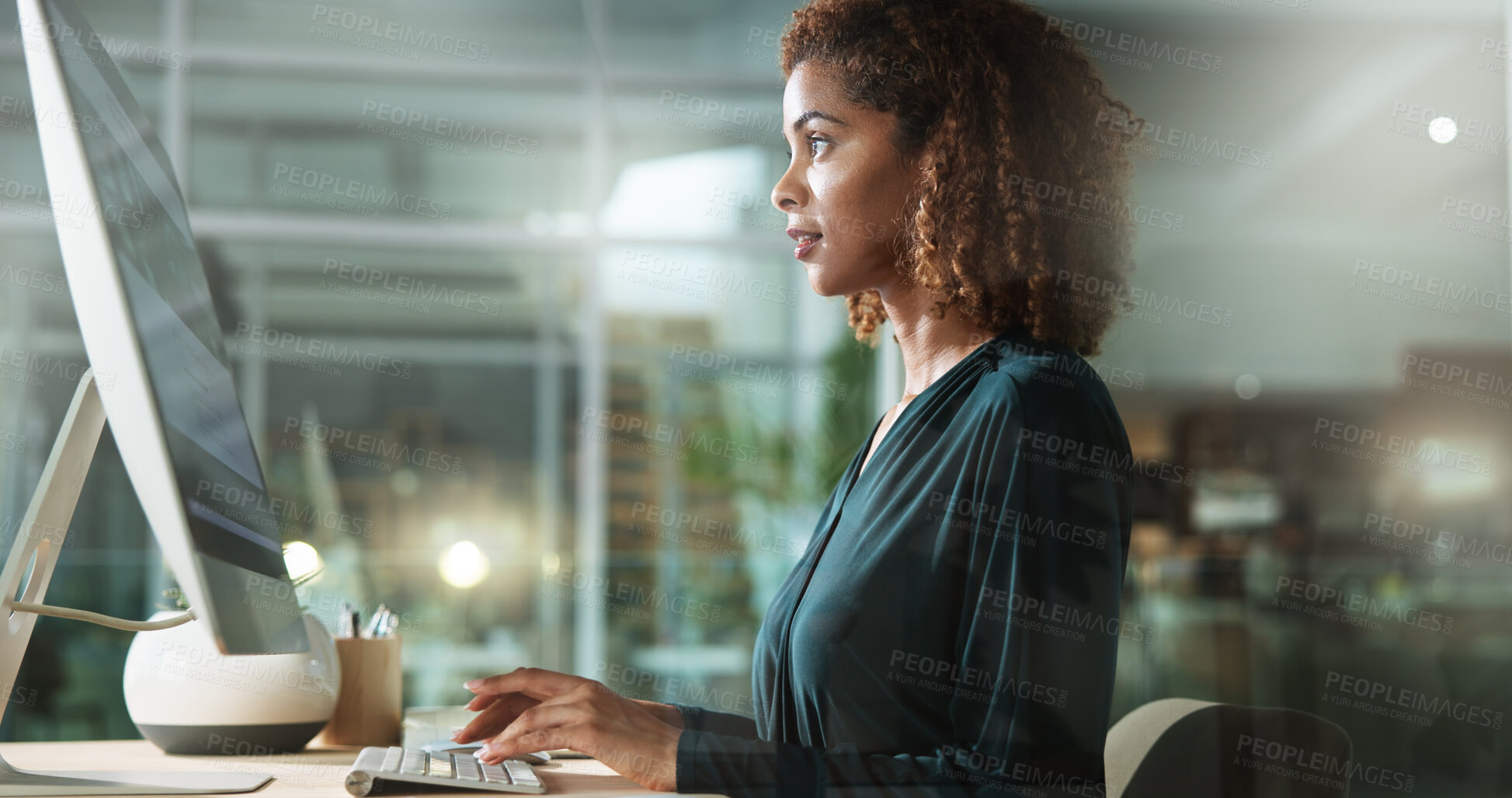 Buy stock photo Computer, typing and creative business woman in office for blog, article or content writing at night. Desktop, startup and worker reading email for social media platform, project or story on overtime