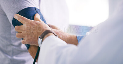 Buy stock photo Doctor, hands and patient with blood pressure machine for healthcare checkup, heart rate or results at hospital. Closeup, medical worker or cardiologist with arm strap for hypertension monitoring