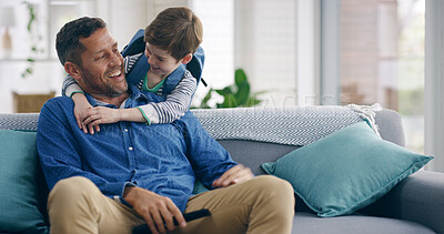 Buy stock photo Boy, dad and hug on sofa with surprise, smile and watching tv with funny memory, care or play in home. Child, father and embrace on couch for television, streaming or movies with game in family house