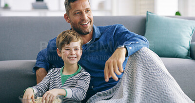Buy stock photo Dad, boy and watching tv on floor, popcorn and smile with streaming in living room at family house. Father, child and happy with snack for television, subscription and movies with bonding in home