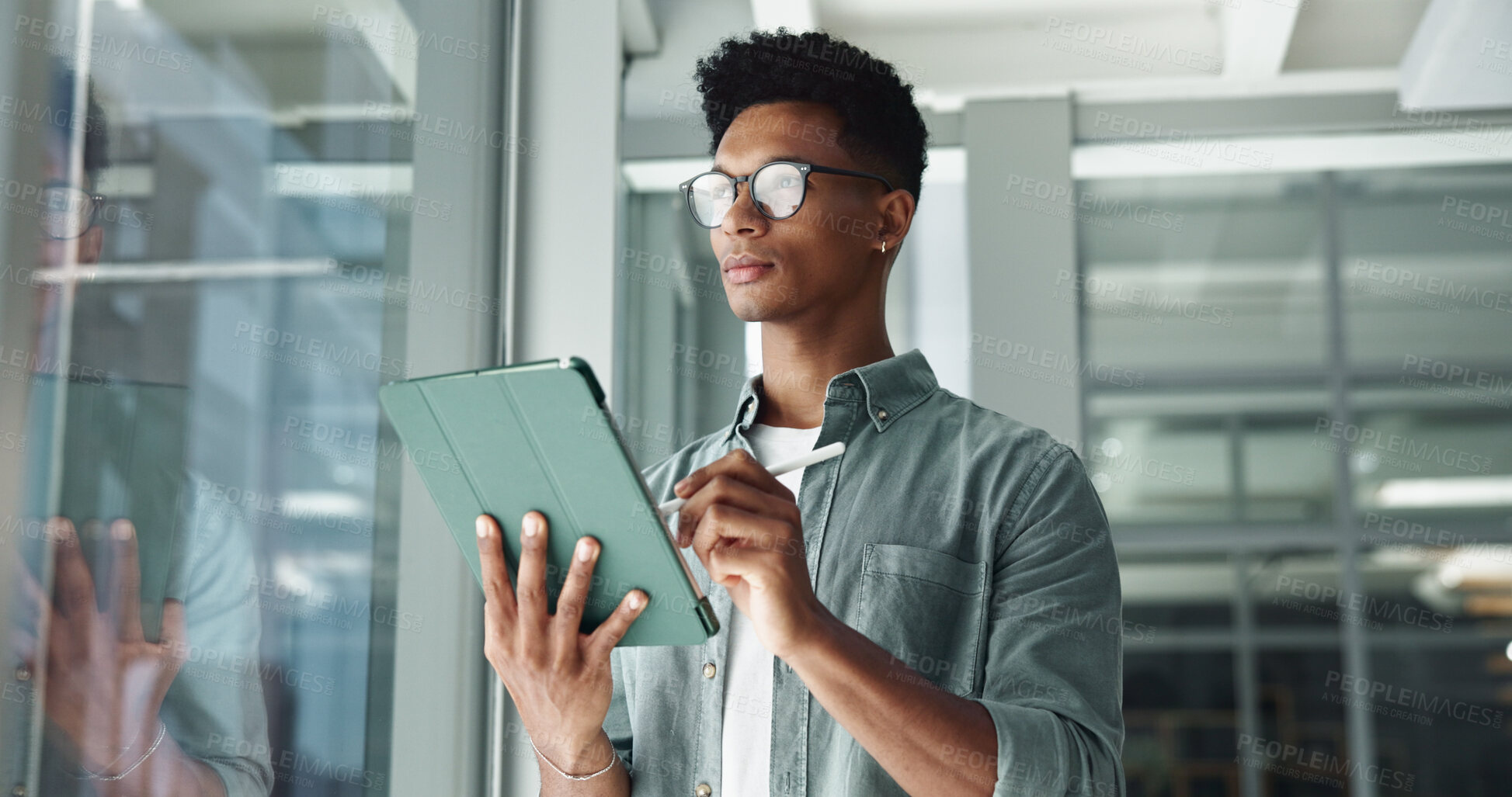Buy stock photo Man, tablet and thinking at window for business, planning and creativity with glasses in office. Designer, tech and reflection in digital agency for ideas, email feedback and networking opportunity