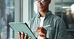 Man, glasses or tablet at window for design, creativity or reading for news in office. Designer, vision and technology in digital agency for web development, company information and business research