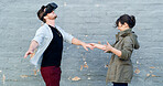 Couple, vr and headset in street with game, laughing and guide for rpg with futuristic tech in city. Woman, man and happy with augmented reality, glasses and playful with metaverse on road in Spain