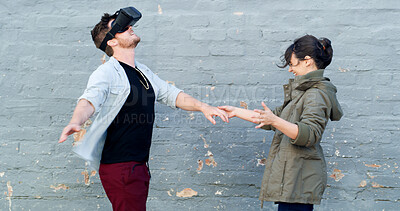 Buy stock photo Couple, vr and headset in street with game, laughing and guide for rpg with futuristic tech in city. Woman, man and happy with augmented reality, glasses and playful with metaverse on road in Spain