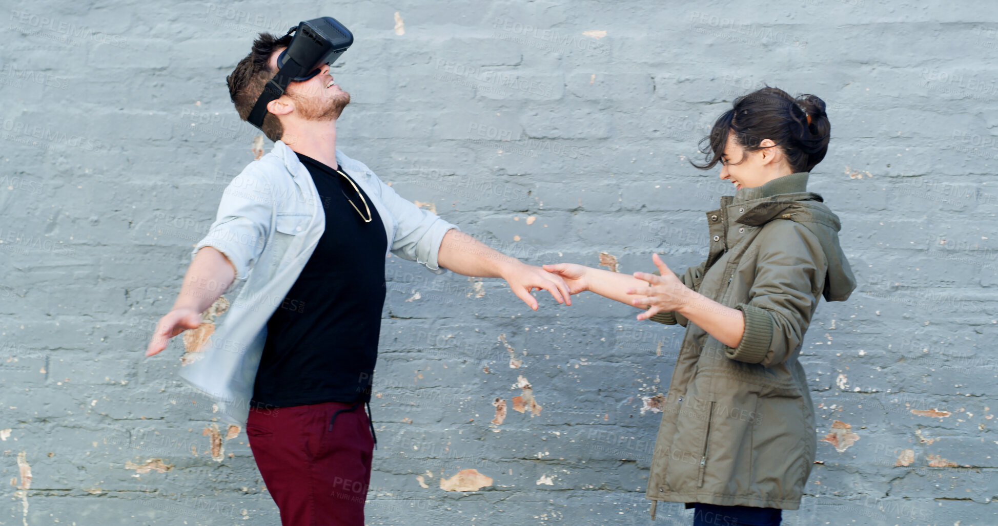Buy stock photo Couple, vr and headset in street with game, laughing and guide for rpg with futuristic tech in city. Woman, man and happy with augmented reality, glasses and playful with metaverse on road in Spain