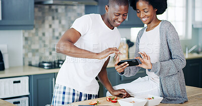 Buy stock photo Happy couple, breakfast and photograph in kitchen for eating fruit salad or detox in home or house. African people, smile or picture of food, nutrition or diet for health, wellness or meal in bowl