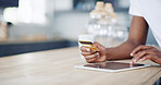 Man, hands and credit card for tablet purchase in home, wireless transaction and online shopping. Male person, banking website and ecommerce for checkout order, payment and kitchen for finance app