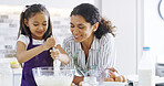 Family, mom and girl with kitchen, baking and learning with ingredients for pastry or dessert cake. Smile, happy mother and cooking daughter help baking pudding, cookies or recipe preparation in home