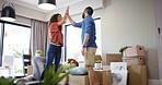 Couple, high five and celebrate moving in new home, relocation success and homeowners for mortgage. People, love and proud of real estate achievement in lounge, support and buy for house security