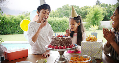 Buy stock photo Birthday cake, family and children eating with parents for celebration, party and singing or clapping. Happy people, excited son and daughter with chocolate dessert, special day and bonding at home