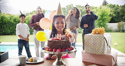 Buy stock photo Birthday cake, big family and excited girl with parents for celebration, party and singing or clapping. Happy people, child and daughter with chocolate dessert, special day and bonding at home event