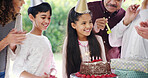 Birthday cake, happy family and children smile with parents for celebration, party and singing or clapping. Generations, kid and daughter with chocolate dessert, special day and bonding at home