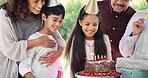 Birthday cake, family and children smile with parents for celebration, party and excited for future growth. Happy generations, kid and daughter with chocolate dessert, special day and bonding at home