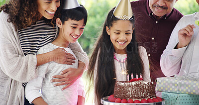 Buy stock photo Birthday cake, family and children smile with parents for celebration, party and excited for future growth. Happy generations, kid and daughter with chocolate dessert, special day and bonding at home