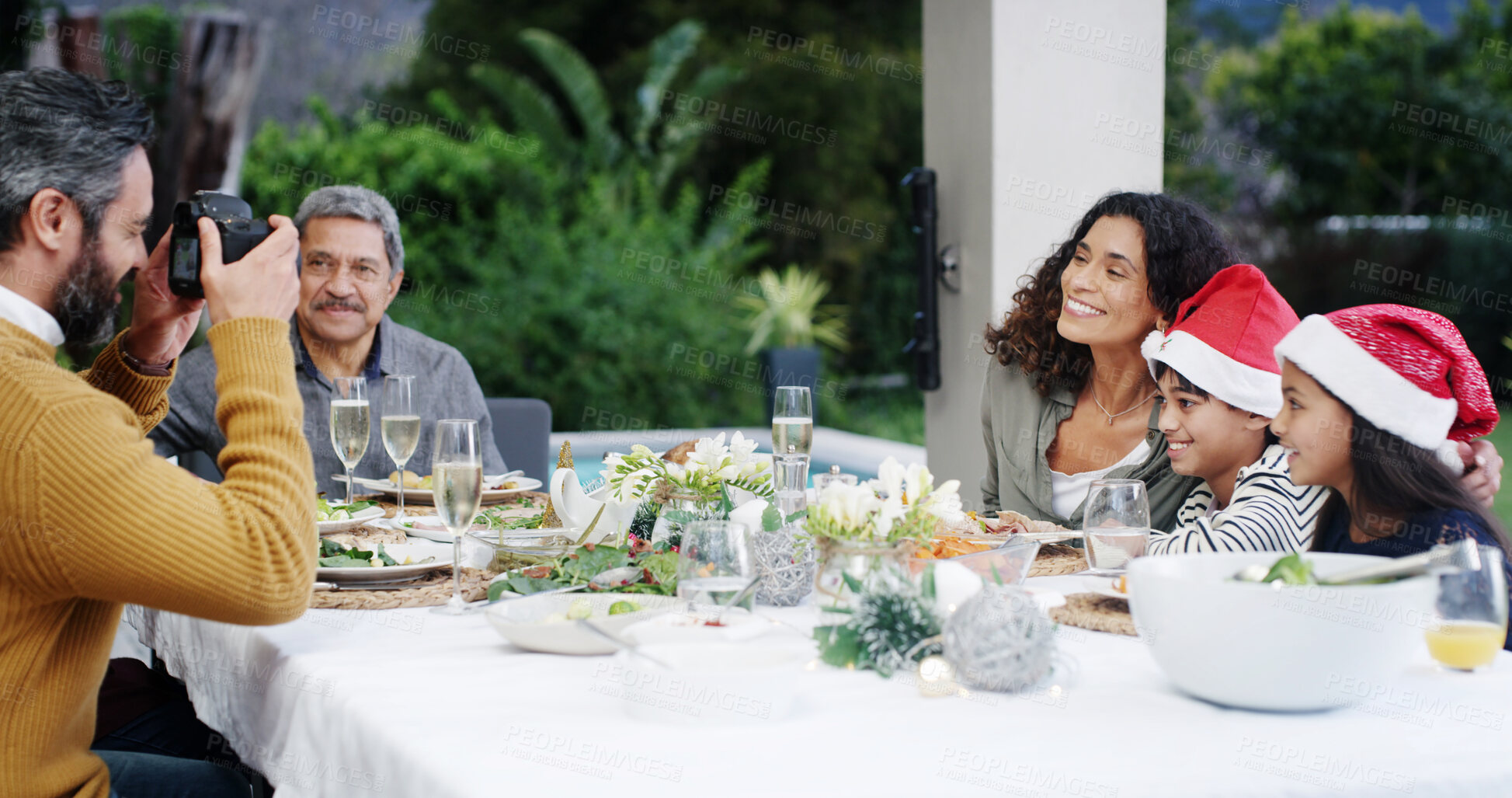 Buy stock photo Camera, kids and happy family with food, picture or love with smile, Christmas or social gathering. Mother, home or people with feast, healthy meal and photograph for memory or celebration together