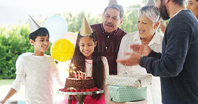 Buy stock photo Birthday cake, big family and girl happy with parents for celebration, party and singing or clapping. Generations, children and daughter with chocolate dessert, special day and bonding at home