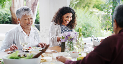 Buy stock photo Family, dinner and women with laughing by home for funny joke, festive celebration or social gathering. Happy people, love and conversation together on patio with food, holiday lunch or thanksgiving
