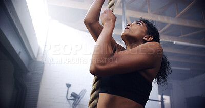 Buy stock photo Fitness, girl and rope climbing at gym for strength training, cardiovascular health and flexibility. Athlete, challenge and endurance workout for healthy body, energy and muscle power at sports club