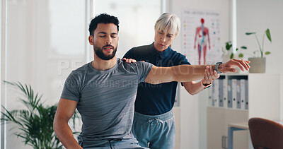 Buy stock photo Stretch arm, physical therapy and patient at consultation for problem, inflammation or arthritis. Person, chiropractor and exercise for injury pain, rehabilitation and recovery of joint muscle
