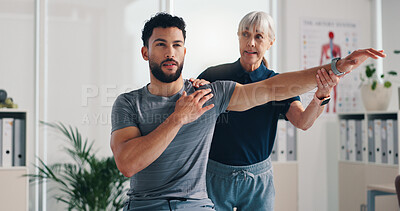 Buy stock photo Physical therapy, stretch arm and patient man at consultation for problem, inflammation or shoulder. Person, chiropractor and exercise for injury, rehabilitation and recovery of muscle damage