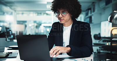 Buy stock photo Night, man and laptop in office with glasses, finance management and budget review at paper. Accountant, tech and profit report in agency for audit deadline, tax compliance and vision for information