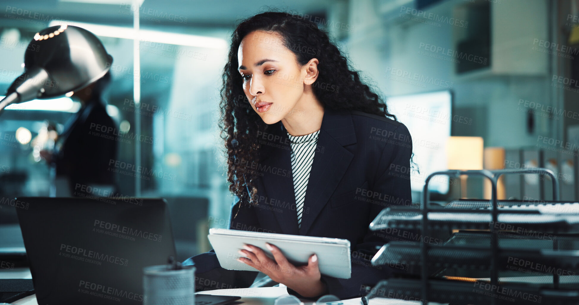 Buy stock photo Night, research or woman accountant with technology for finance management, business and budget review. Accounting, tablet and profit report on laptop for audit deadline, tax compliance or reading