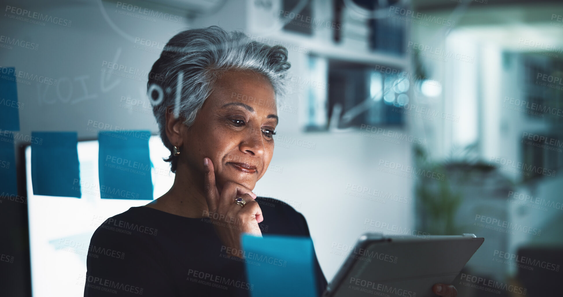 Buy stock photo Mature woman, thinking and night with tablet for planning, brainstorming or business decision at office. Female person, CEO or thoughtful employee working late with technology for corporate idea
