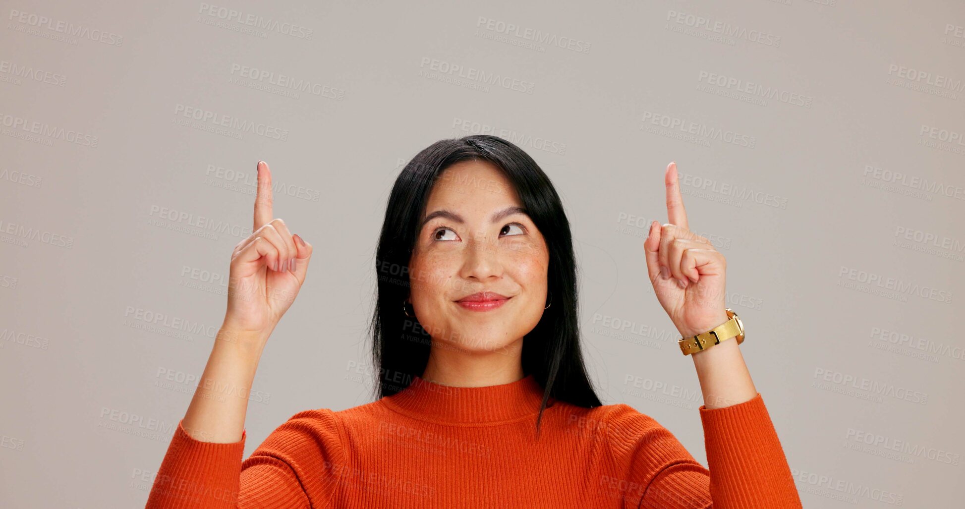 Buy stock photo Asian woman, point up and smile with choice, promotion and deal with mock up space by background. Japanese girl, person and model with direction, decision and show with sign, emoji or announcement