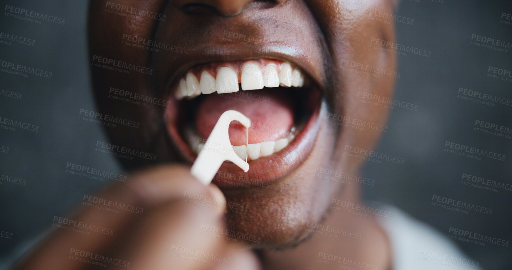 Buy stock photo Dental, floss and cleaning with teeth of black man for oral hygiene, tooth grooming or gum health. Self care, morning routine and cavity prevention with closeup of person on dark background for mouth