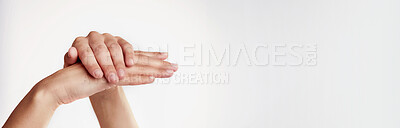 Buy stock photo Person, hands or hygiene with skincare on banner for natural beauty, soft or gentle skin on a white studio background. Closeup, model or fingers with texture, nails or clean treatment on mockup space