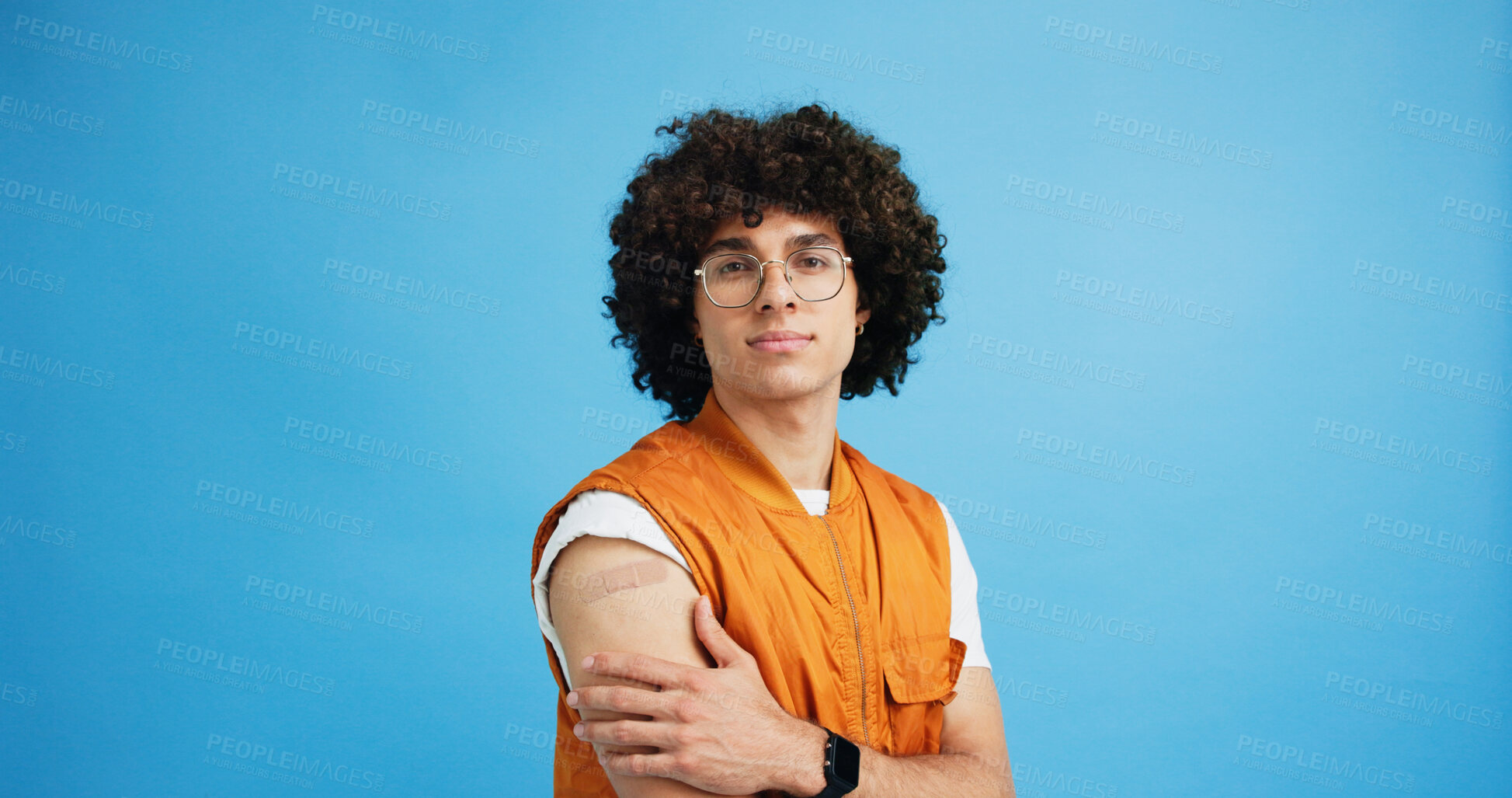 Buy stock photo Man, portrait and plaster in studio for medicine, injection wound and afro guy on blue background. Male person, mockup space and vaccination awareness for disease prevention, bandage and treatment